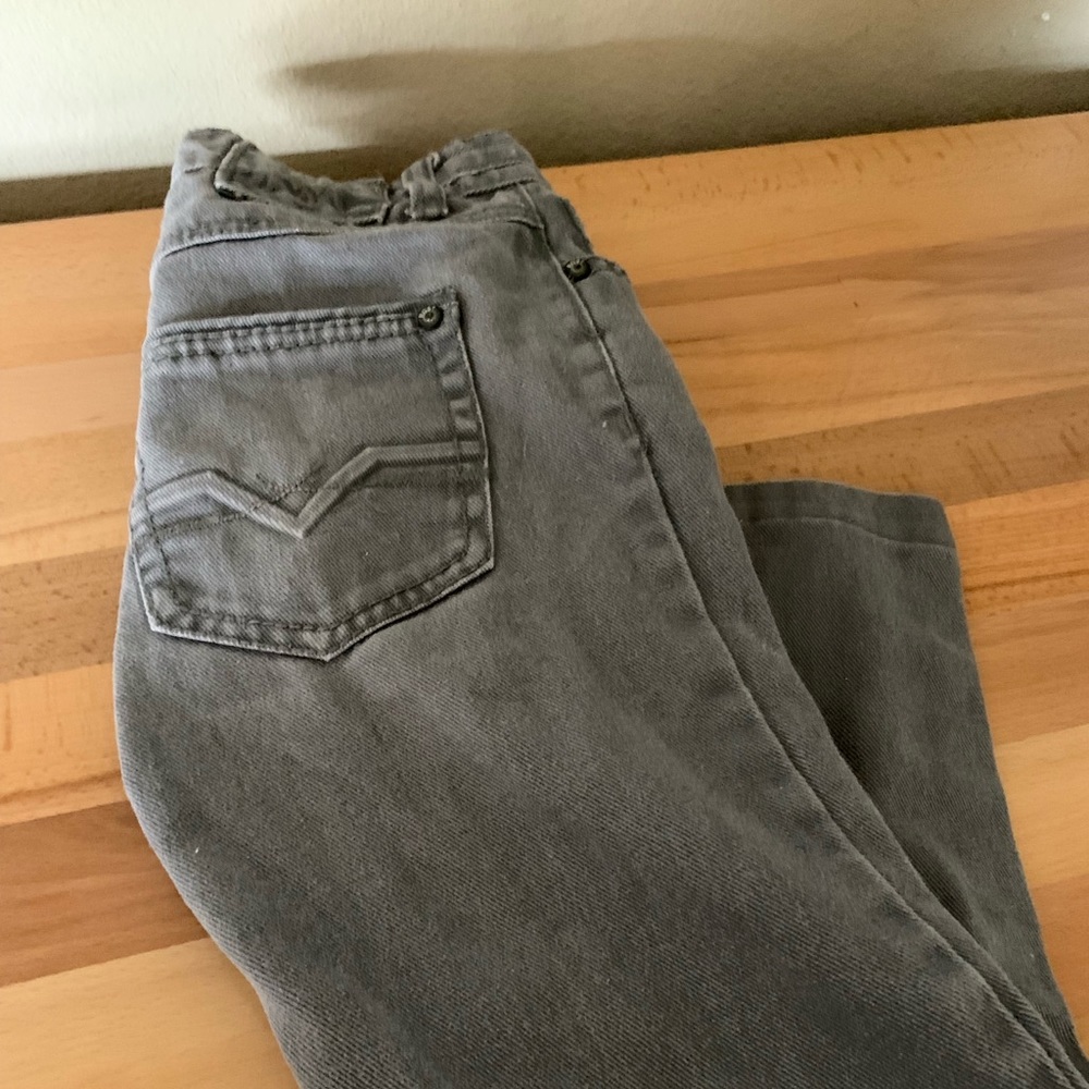 Grey jeans.